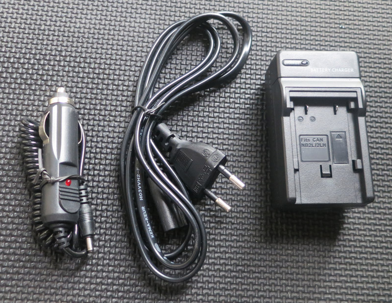 Chargeur de batterie, avec cordon secteur et allume-cigares